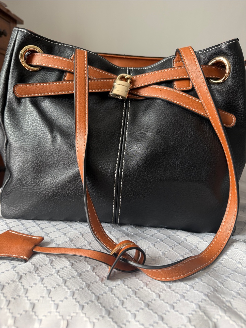 Black and Tan Drawstring Shoulder Bag with Gold Lock